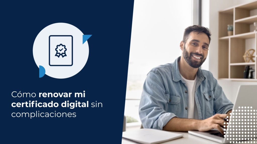 Hombre joven sonriente trabajando en una computadora en una oficina moderna. Busca cómo renovar un certificado digital.
